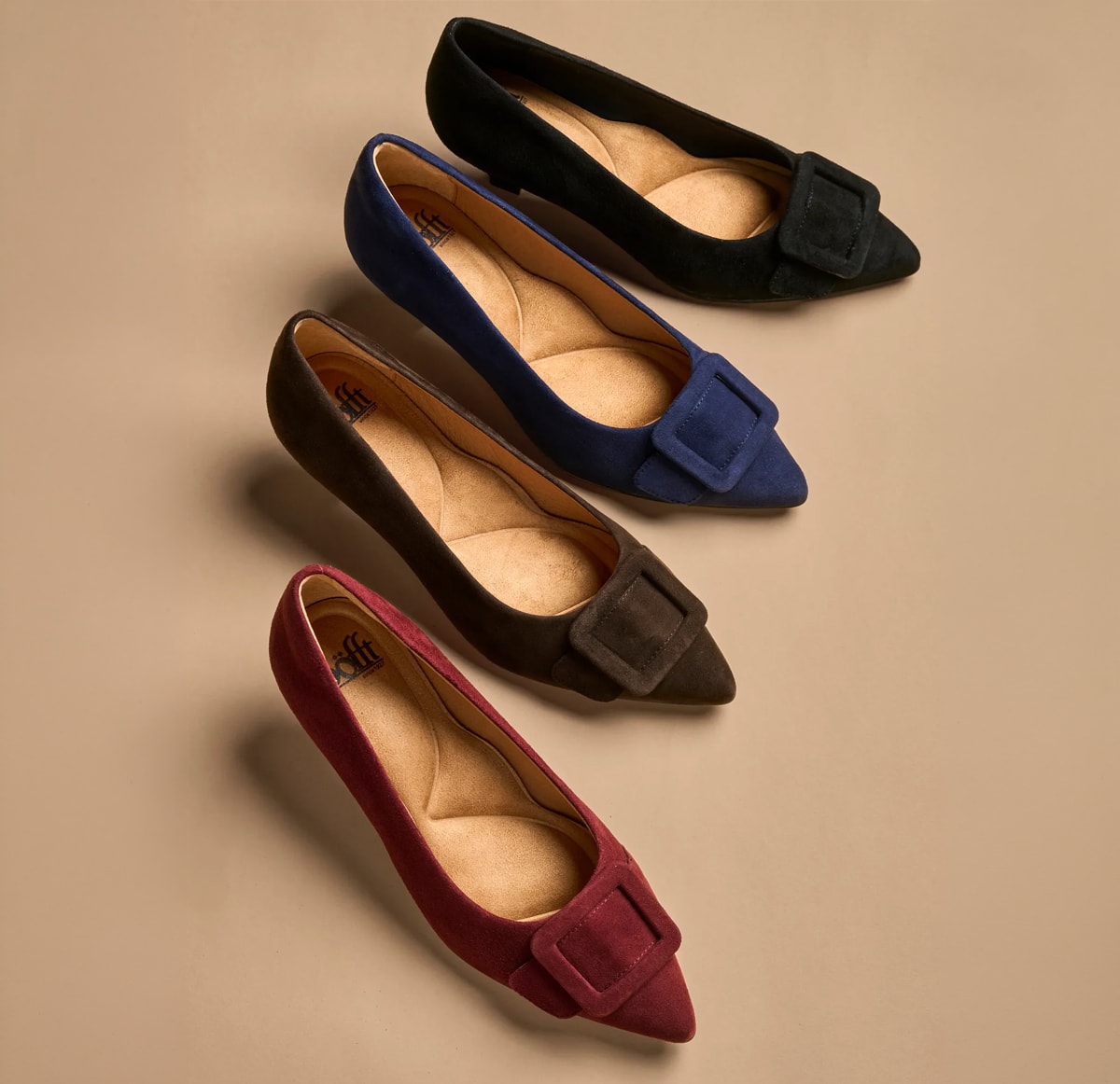 Featuring the Sadie kitten heel pump in black, red, brown and blue suede.