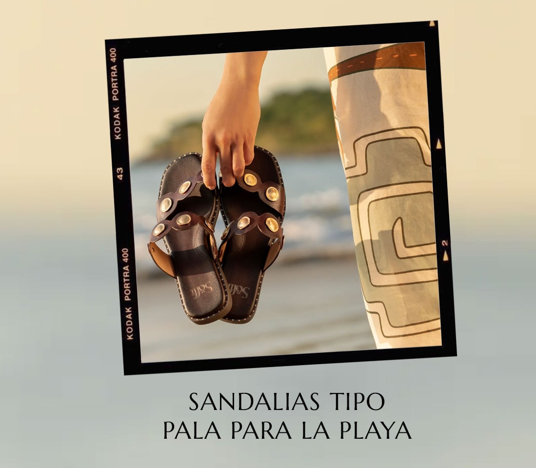Sandalias tipo pala para la playa. Presentamos la sandalia Ezra en color marr&oacute;n.