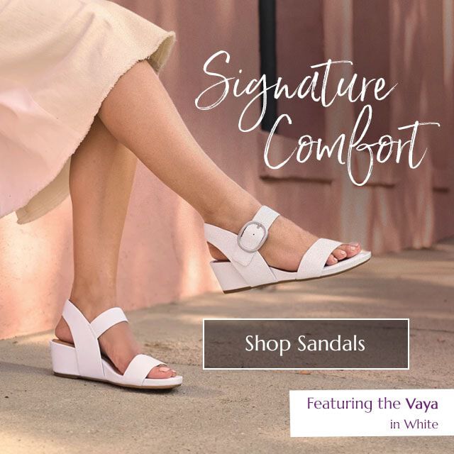 Signature Comfort. Featuring the Vaya wedge sandal in White. Shop Sandals.
