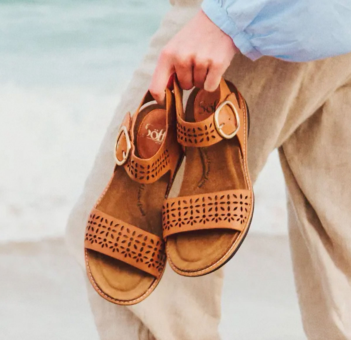 Featuring the bali sandal in tan.