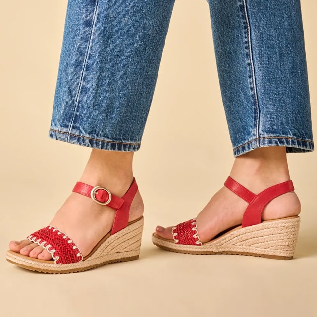 Featuring the Inez sandal in red.