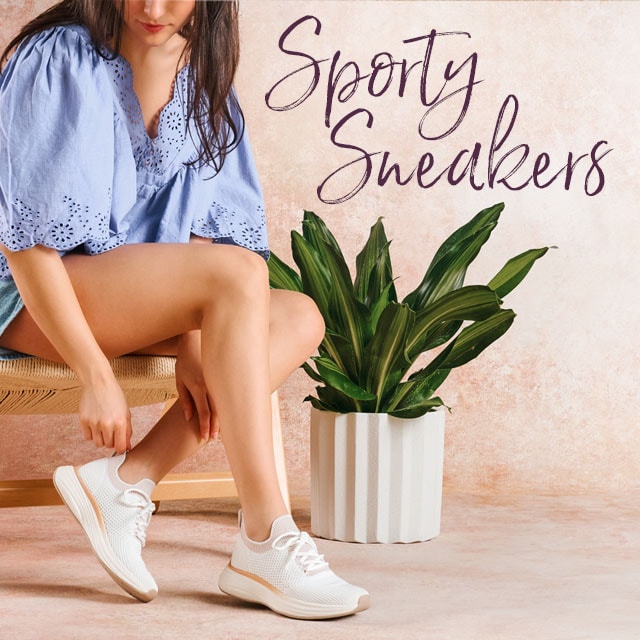 Sporty Sneakers. Featuring the Trudy sneaker in white.